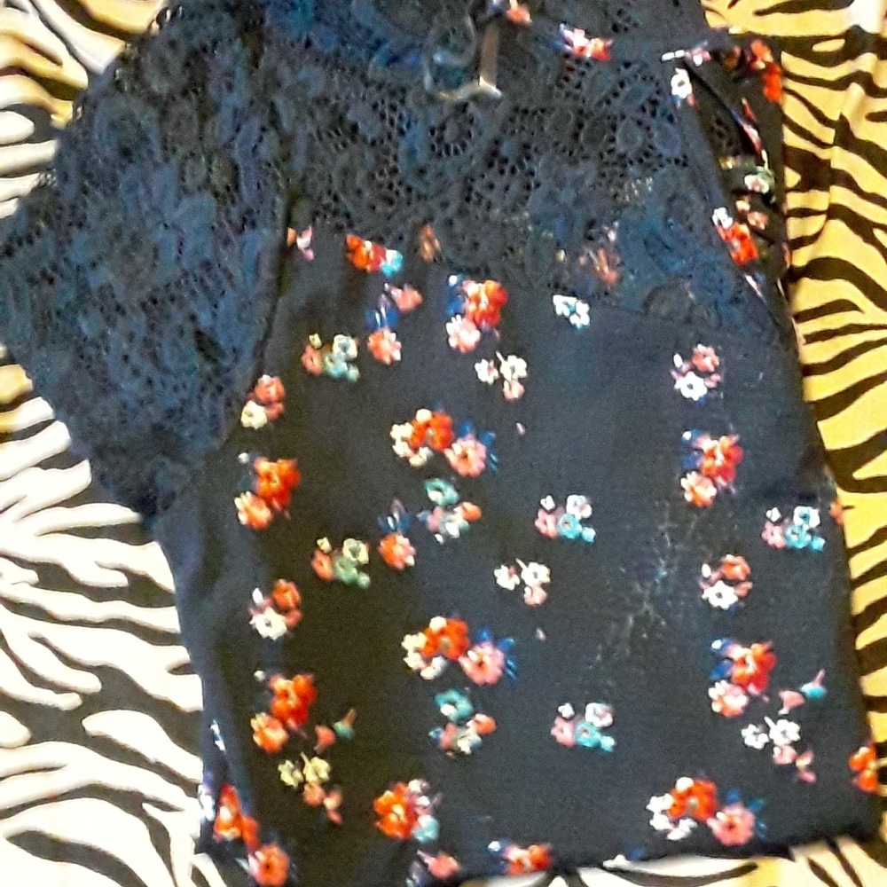 Blue shirt with flowers